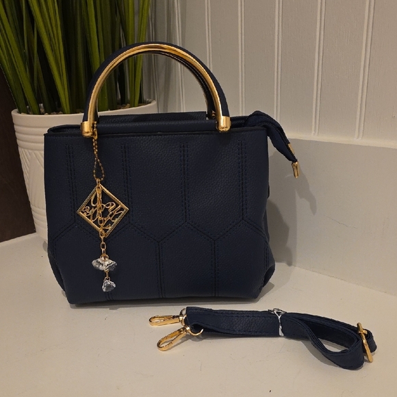 Elegant Navy Blue Handbag with Gold Accents - Picture 2 of 6